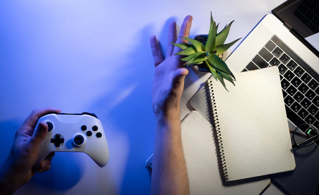 A gamer on a console with renewable energy icons overlaid, in a cozy room.